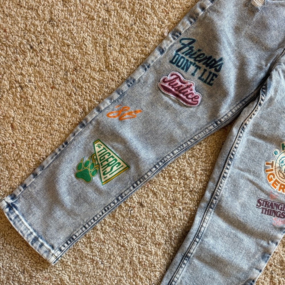 EUC Stranger Things x Justice Light Blue Jeans with Patches & graphics size 12 - Picture 2 of 5